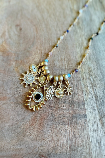 gold pendant and bead necklace 